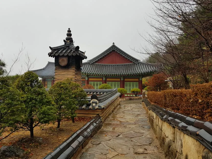 Scenic view of a traditional Korean temple in autumn, showcasing cultural architecture.